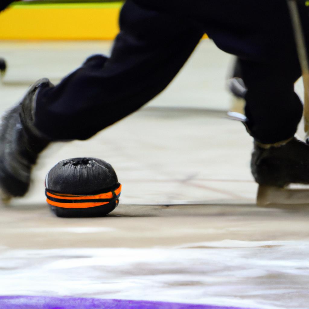 El Rinkball Es Un Deporte De Equipo Jugado En Una Pista De Hielo, Similar Al Bandy, Pero Se Juega Con Una Pelota Y Palos De Hockey Sobre Hielo.